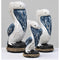 Pelicans Sitting On Posts